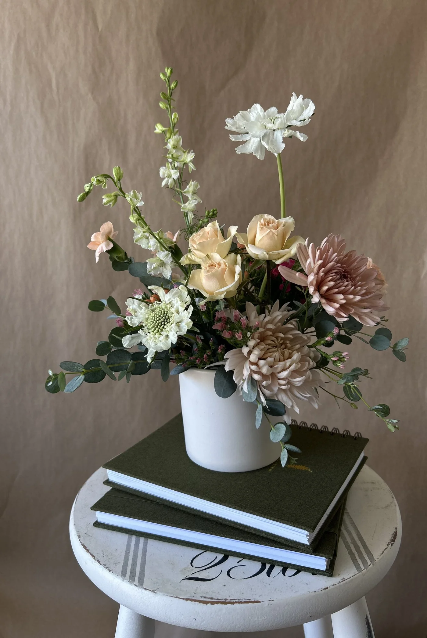 The James arrangement in a white vase